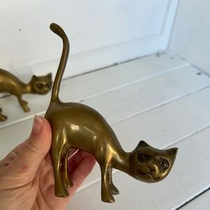 pair of two vintage brass cats